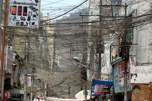 Electric lines over a street in India (source: The Hindu).